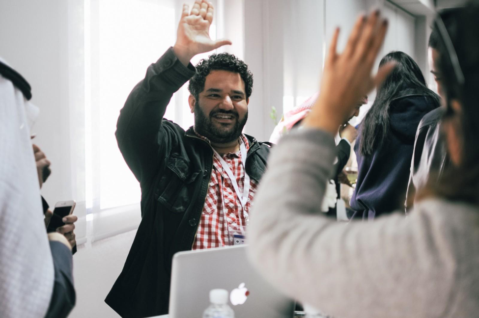 Trainer asks for a show of hands at TechCamp Kuwait